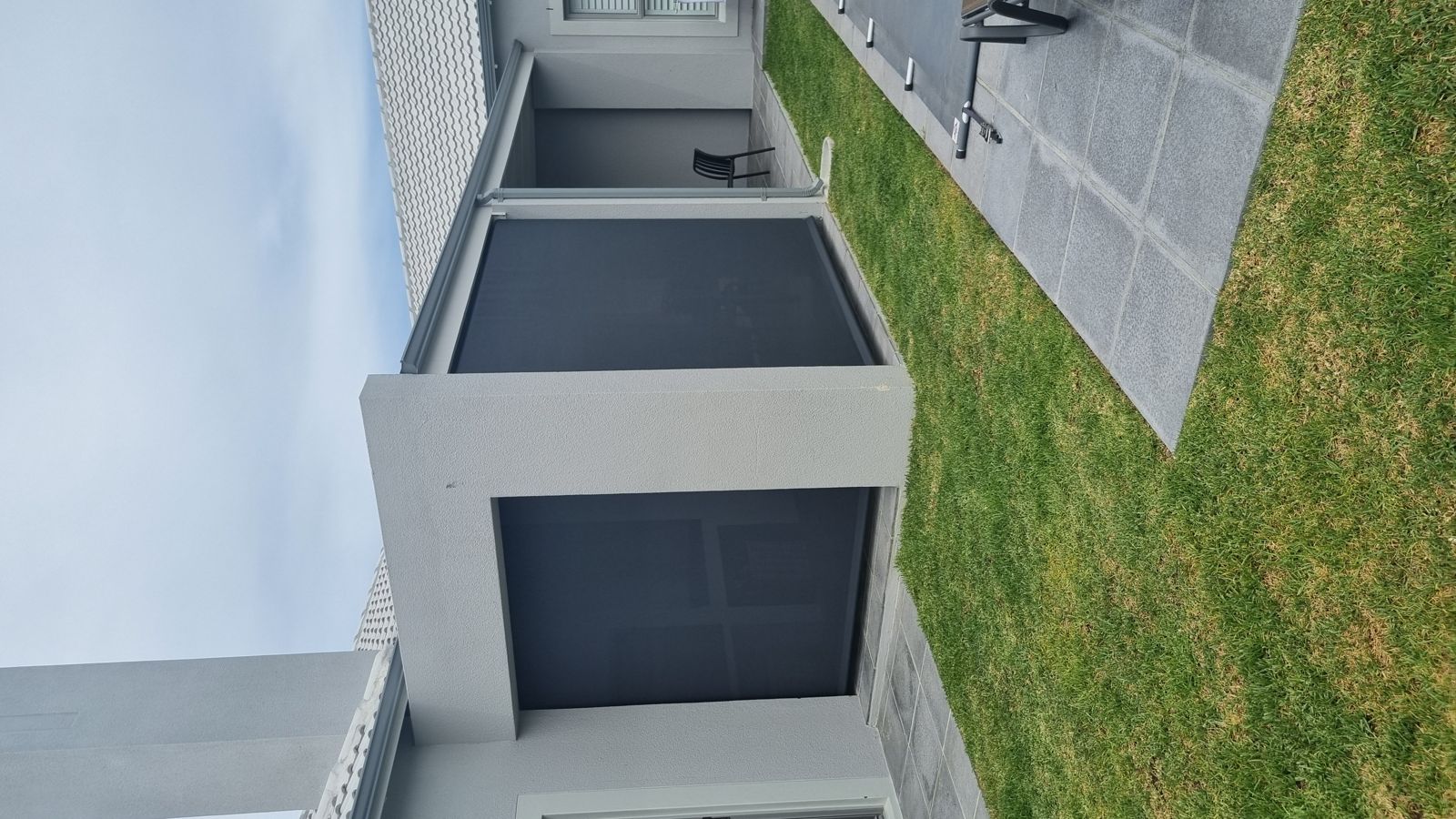 Charcoal blinds on a modern home