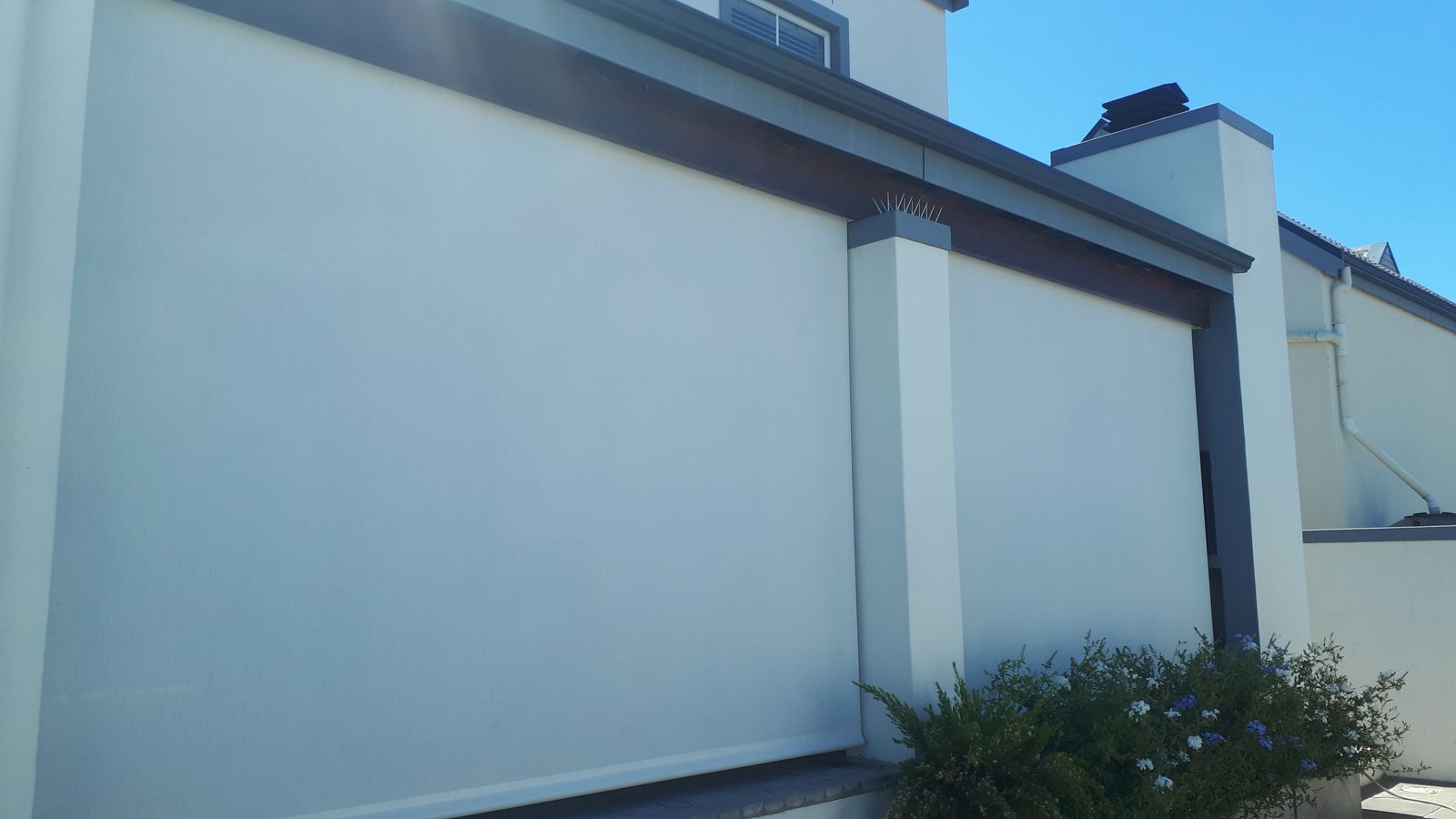 White blinds along a west-facing wall